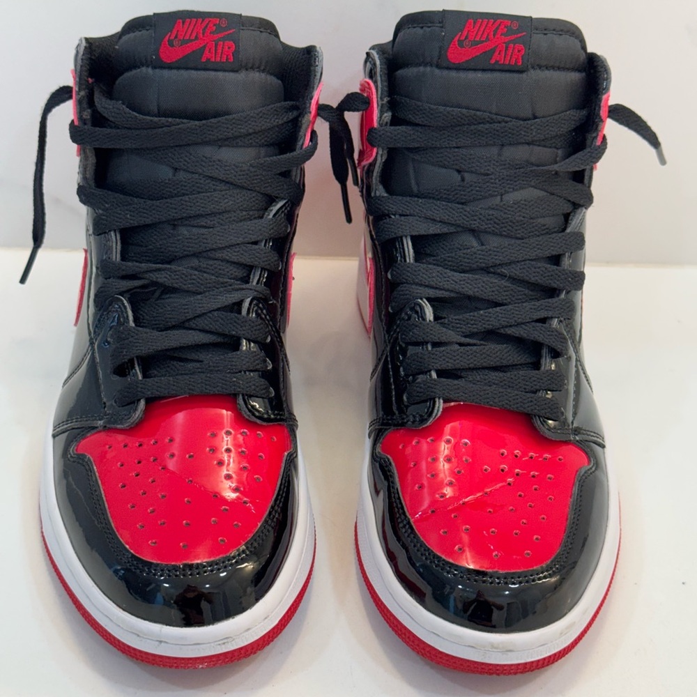Nike Black and Red High-Top Sneakers with Glossy Finish like new without box.